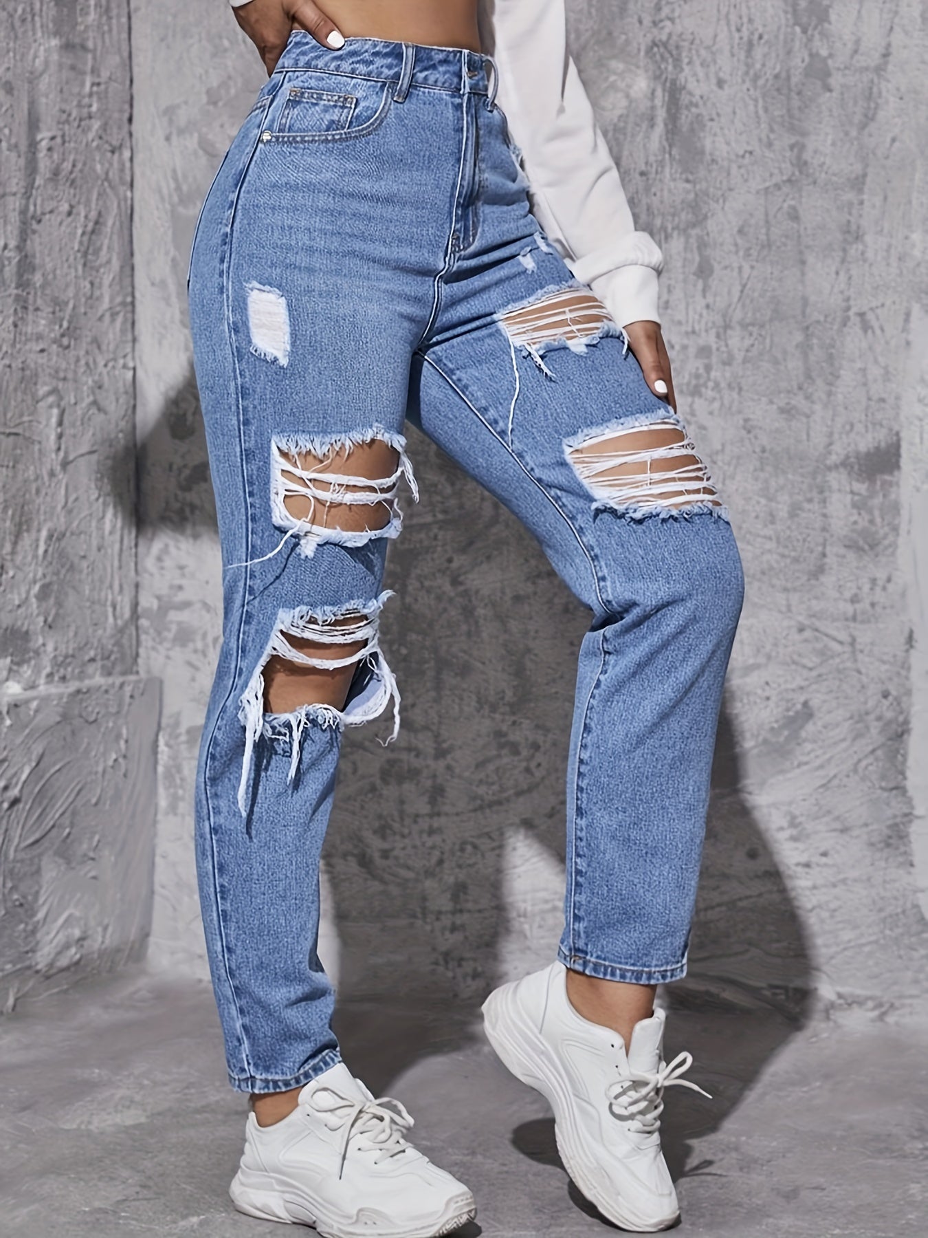 Ripped Distressed Whiskering Jeans